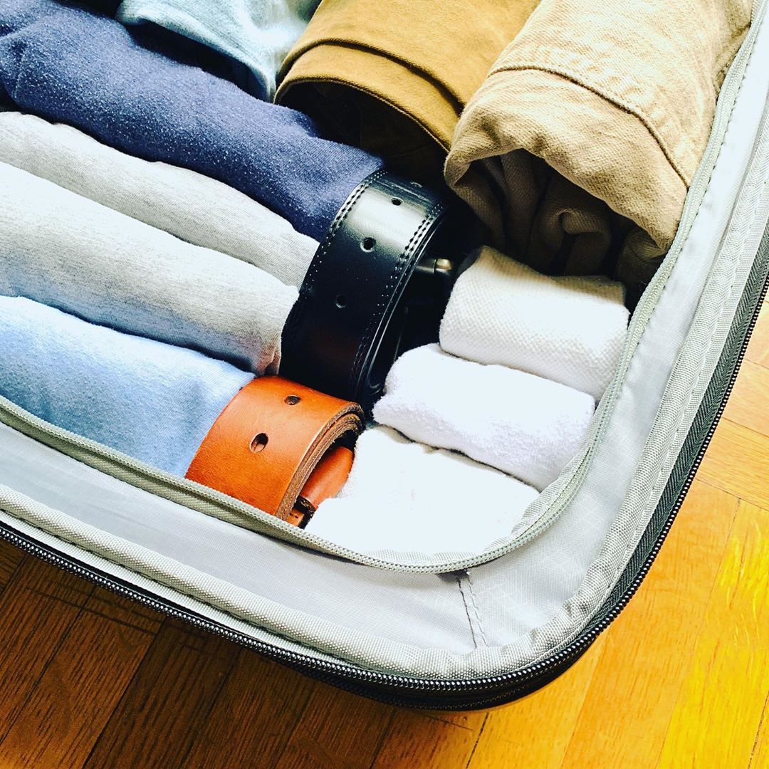 Rolled clothes in suitcase. Photo by Instagram user @simplejoywithann