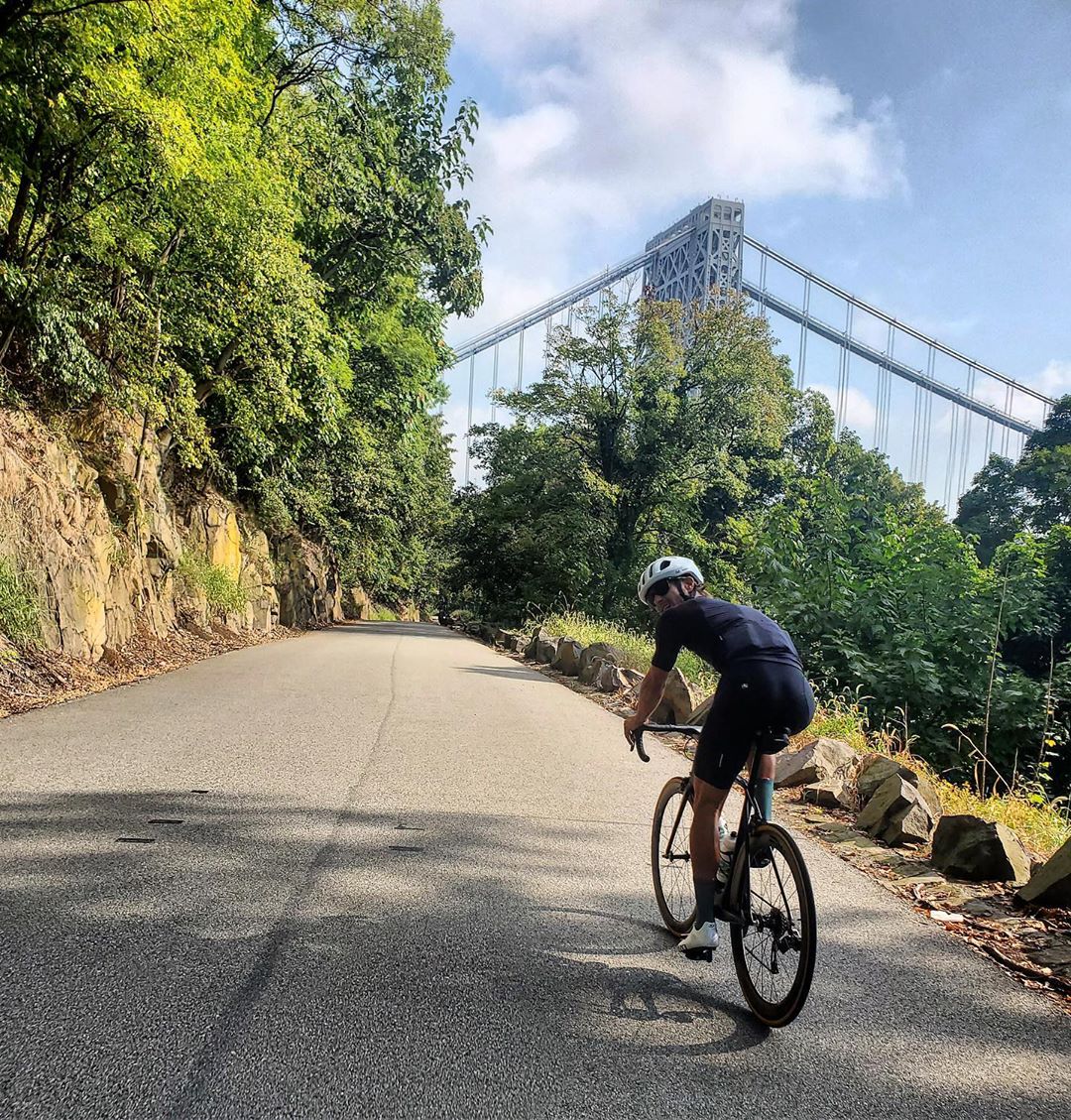 Man riding bike near George Washington Bridge. Photo by Instagram user @twj_17_