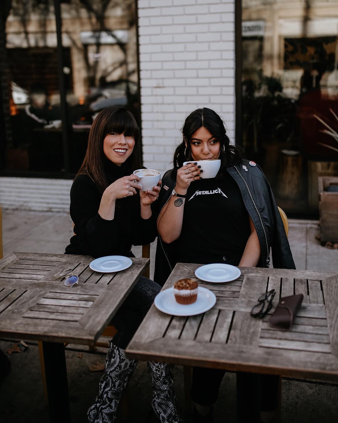 Women Drinking Coffee Together Outside a Coffee Shop. Photo by Instagram user @myfashionseries