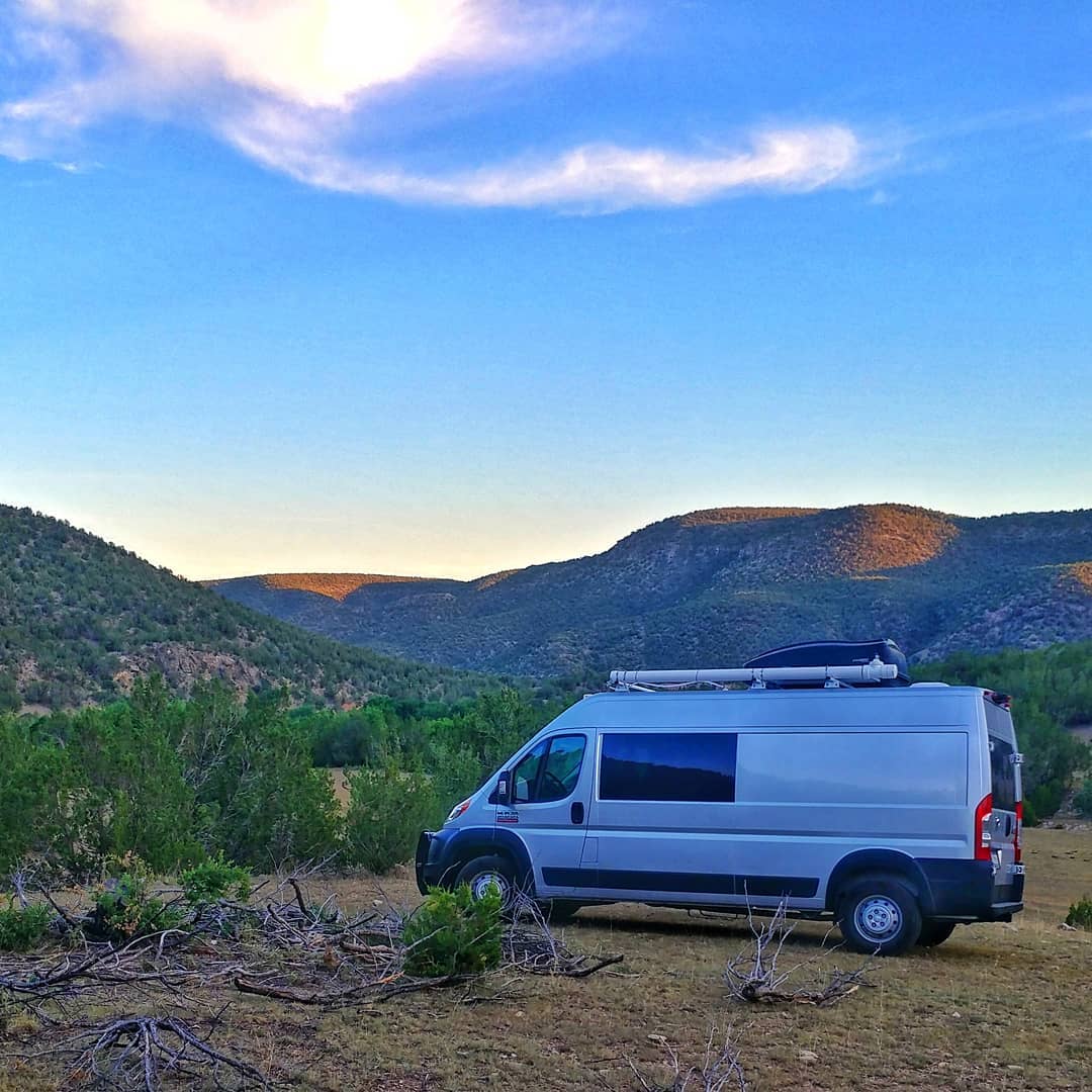 Cargo van parked in the mountains. Photo by Instagram user @gonzos_big_adventure