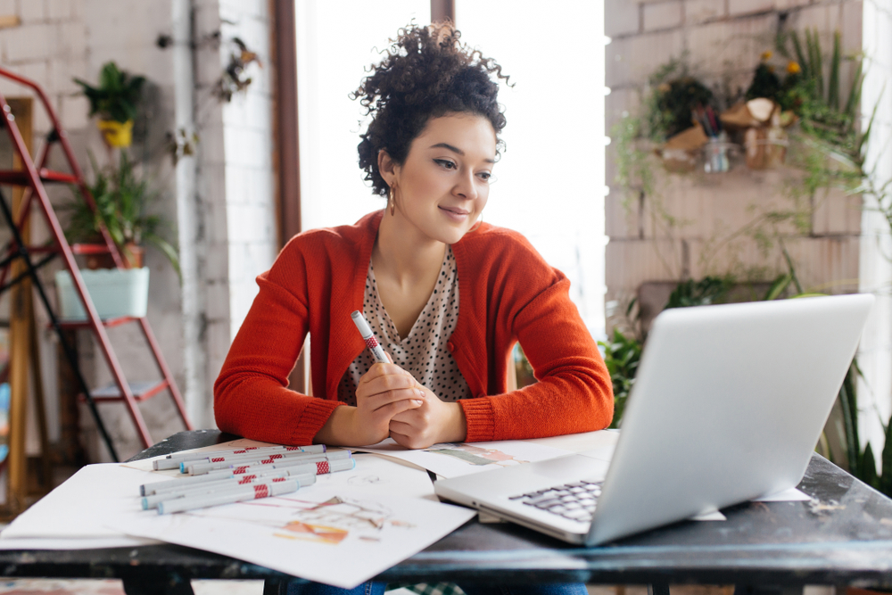 Young woman running business from home