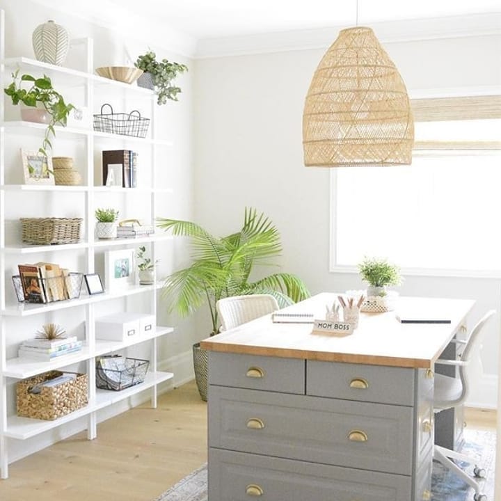 Home office with bookshelf organization. Photo by Instagram user @luminlamphouse