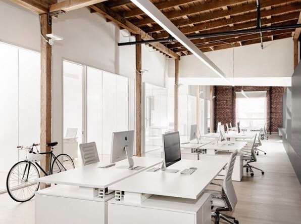 Open Space Work Space with White Desks. Photo by Instagram user @materialisthq