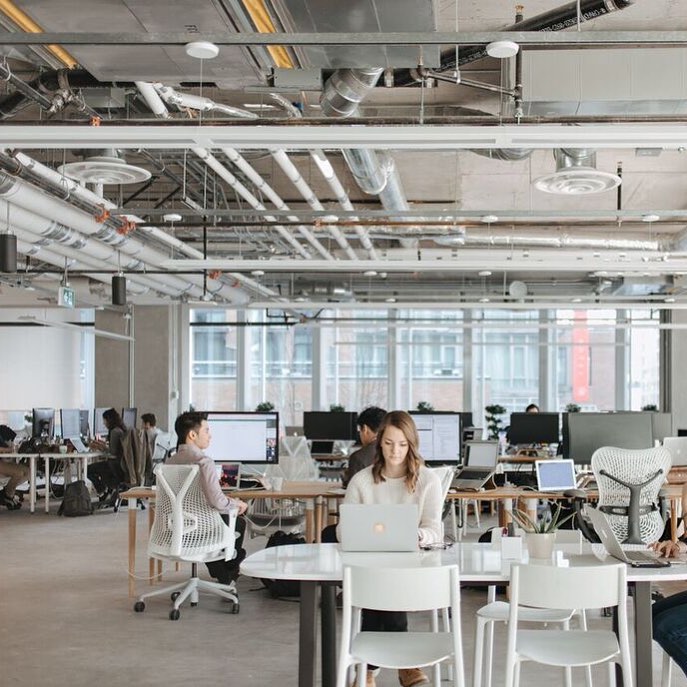Large Open Office Space With People Working at Desks. Photo by Instagram user @area3design