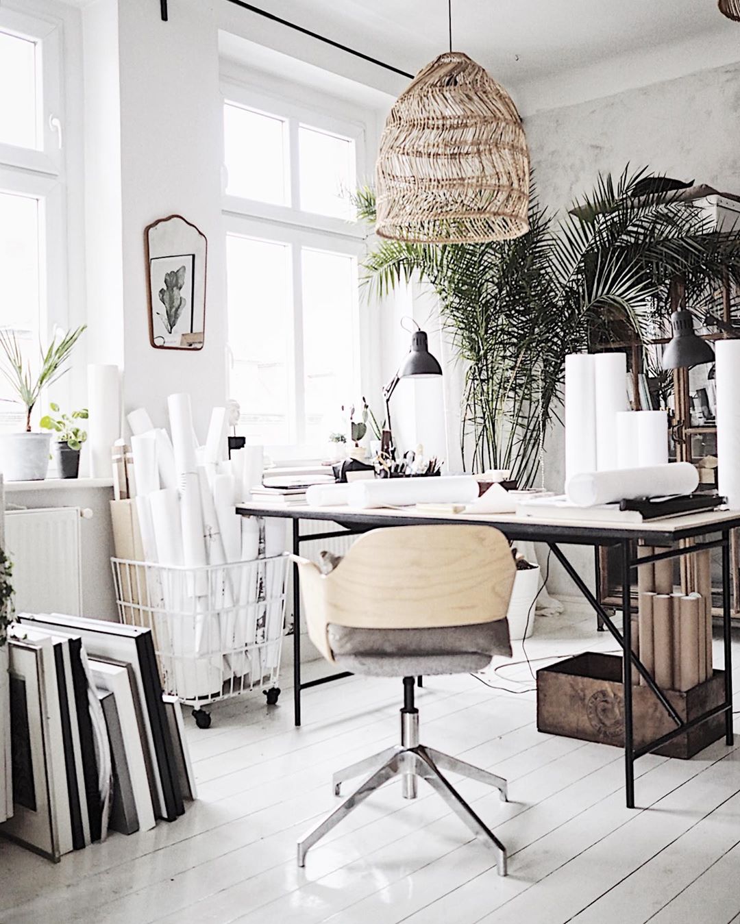 Art workstation set up in loft. Photo by Instagram user @margo.hupert.art