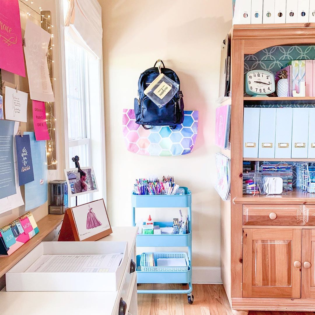 Home office with rolling storage. Photo by Instagram user @jenmackintosh