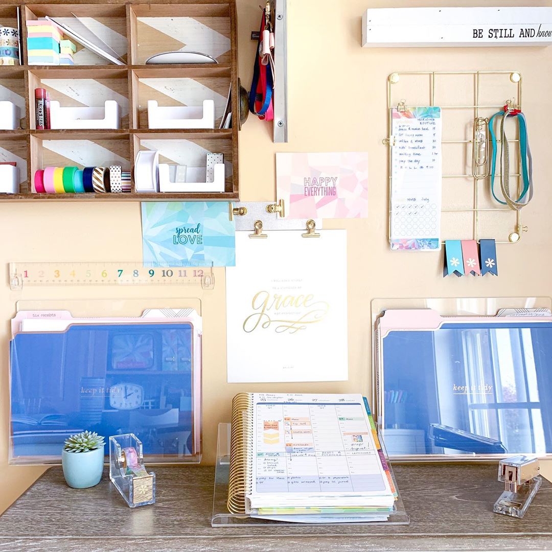 Organized home office with wall filing. Photo by Instagram user @jenmackintosh