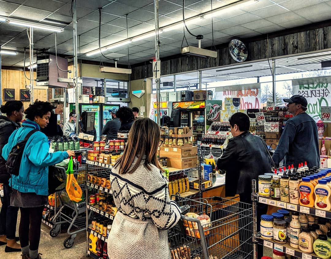 People standing in line at grocery store. Photo by Instagram user @matchapunk