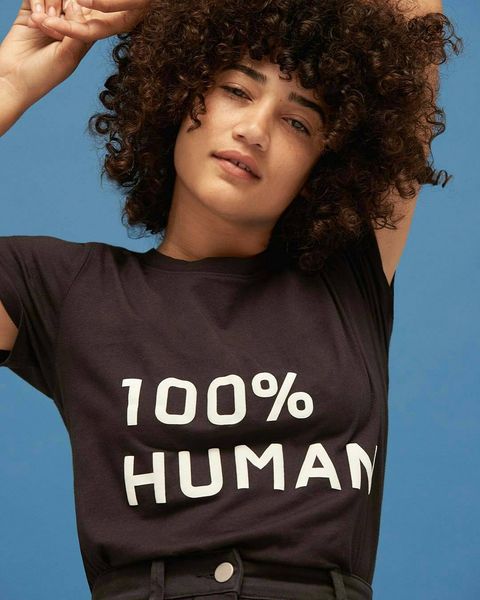 A model staring intently into the camera wearing a 100 percent human brand shirt. shirt.