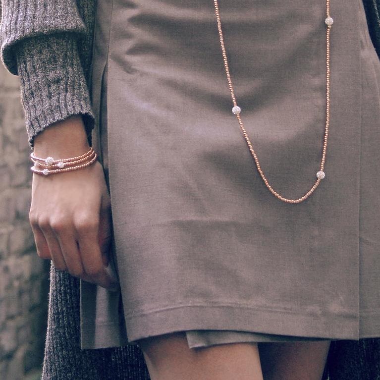 Woman Wearing Sky Rose Gold Black Tie Jewelry. Photo by Instagram user @samesky