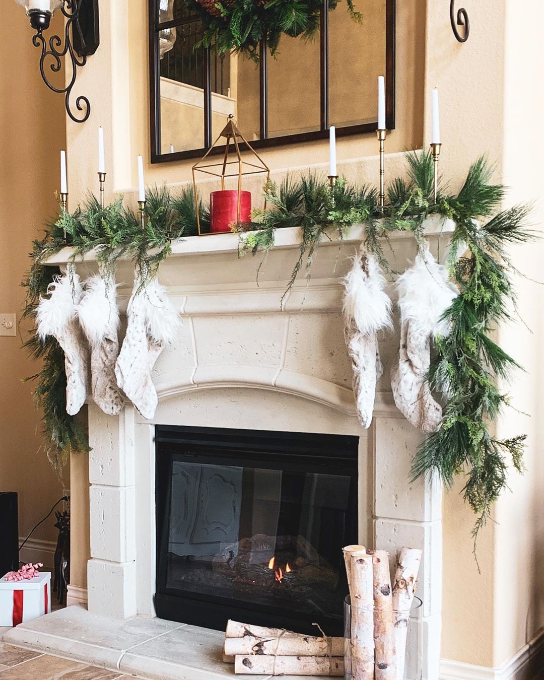 Mantel decorated for Christmas. Photo by Instagram user @lifeofalley