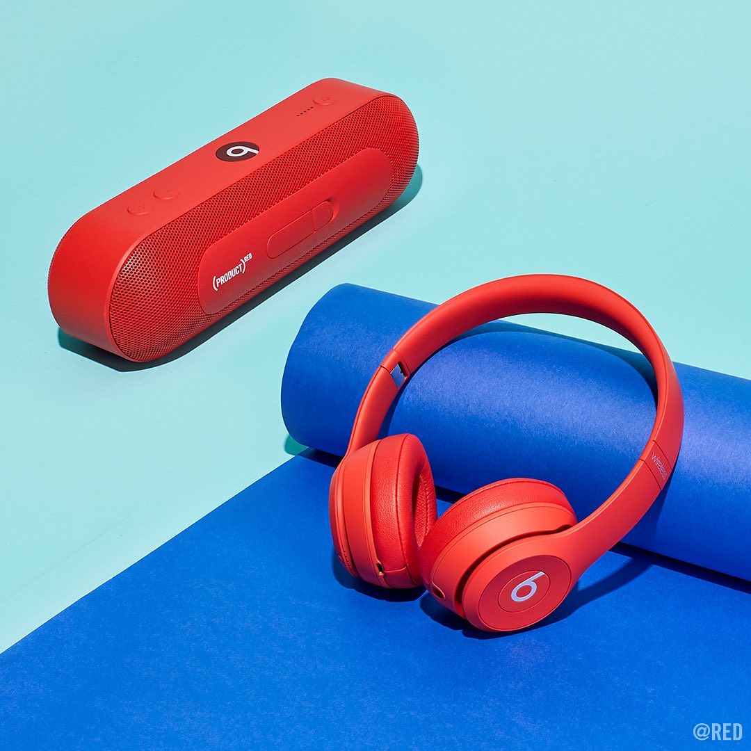Red headphones and speaker on blue mat. Photo by Instagram user @red