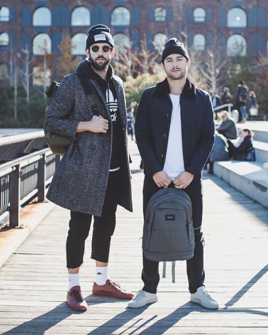 Two guys holding black bags. Photo by Instagram user @statebags