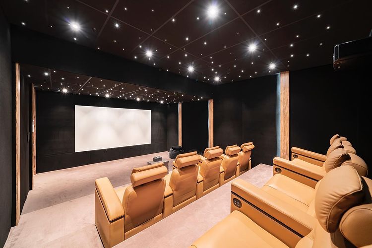 home theater room with stair ceiling. Instagram photo by @justingarrison