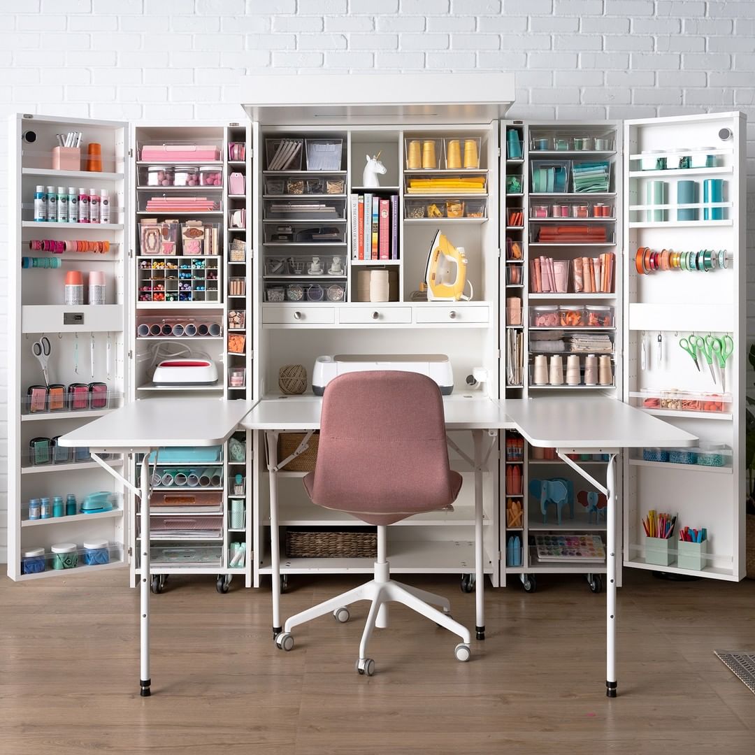 Craft Room Desk with Large Fold Open Storage Cabinet. Photo by Instagram user @createroomco