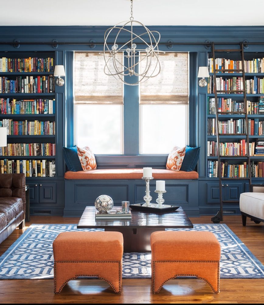 comfortable blue home library designed around a reading nook photo by Instagram user @buxtonelsternwickcaulfield