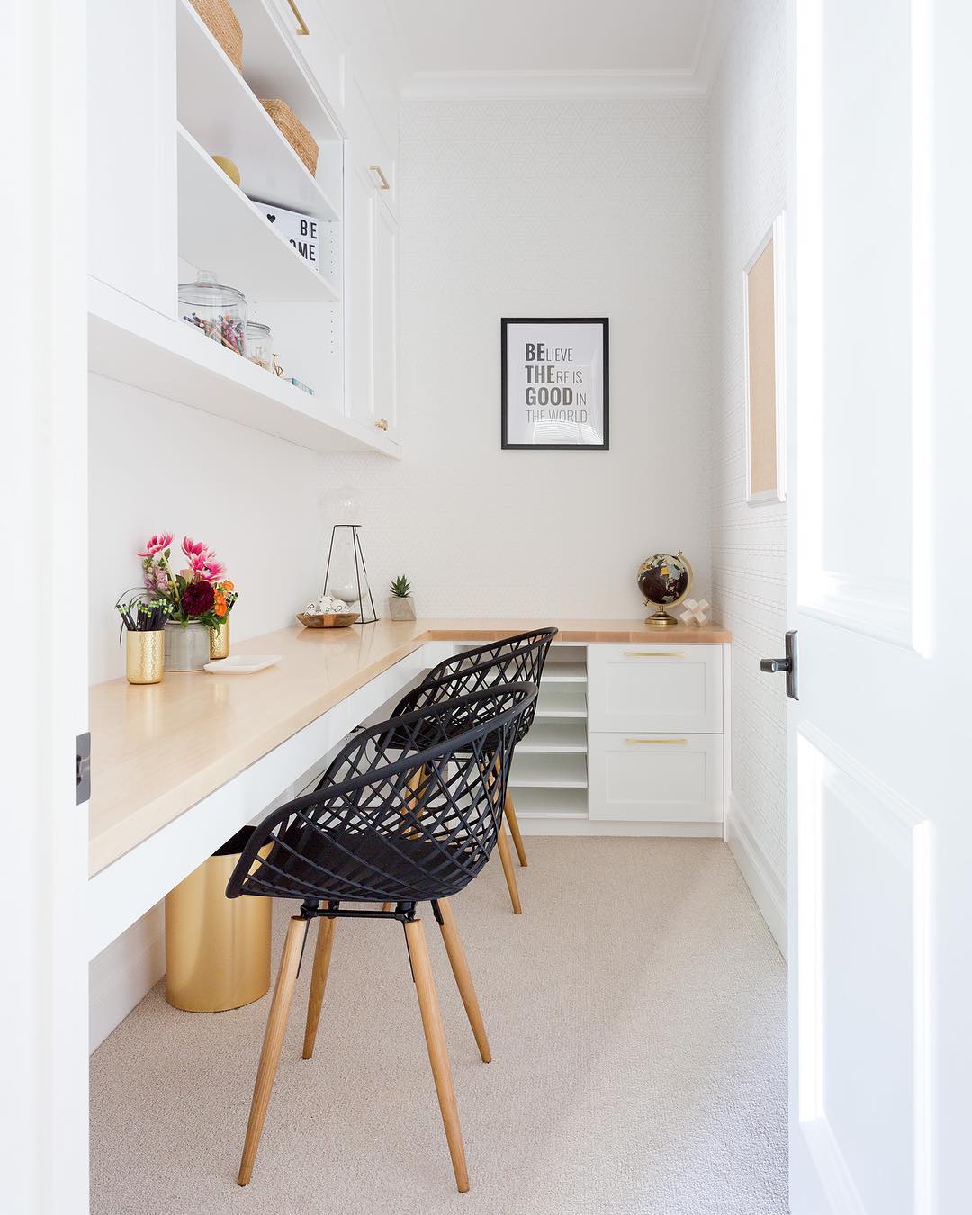 simple two person office with long desk and minimal items photo by Instagram user @amybartlam