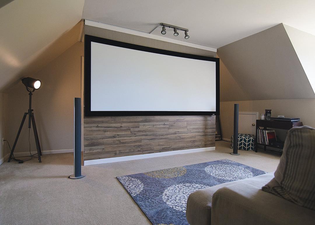 attic home theater with projector screen photo by Instagram user @elite_screens