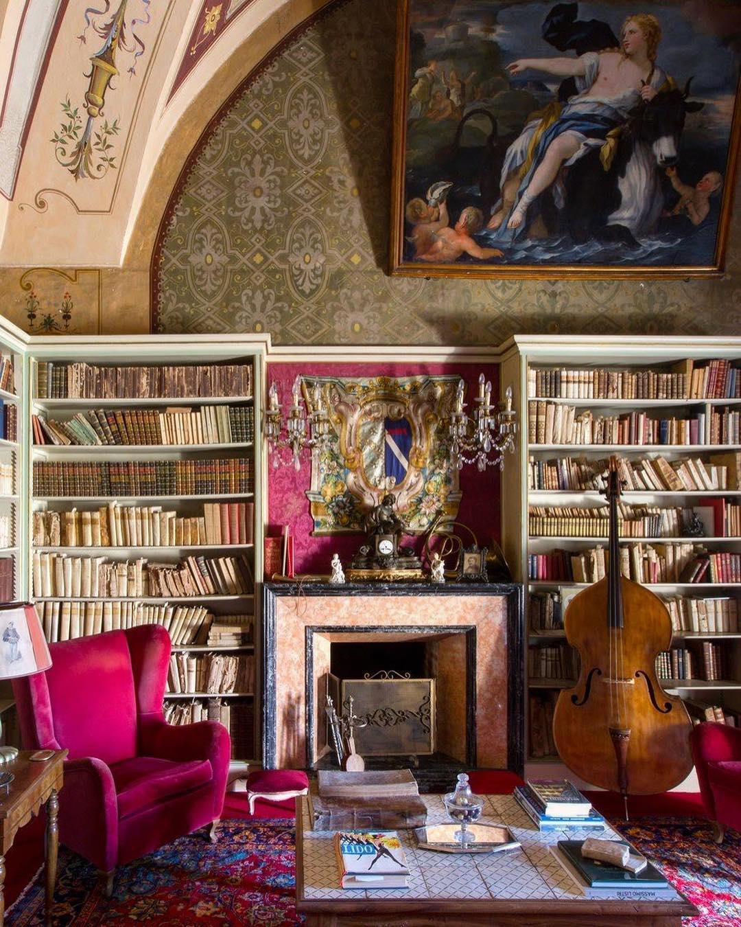 fairytale style home library with cello in the corner photo by Instagram user @decorativefair