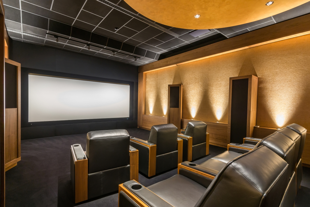 Neutral tans and black in a home theater room