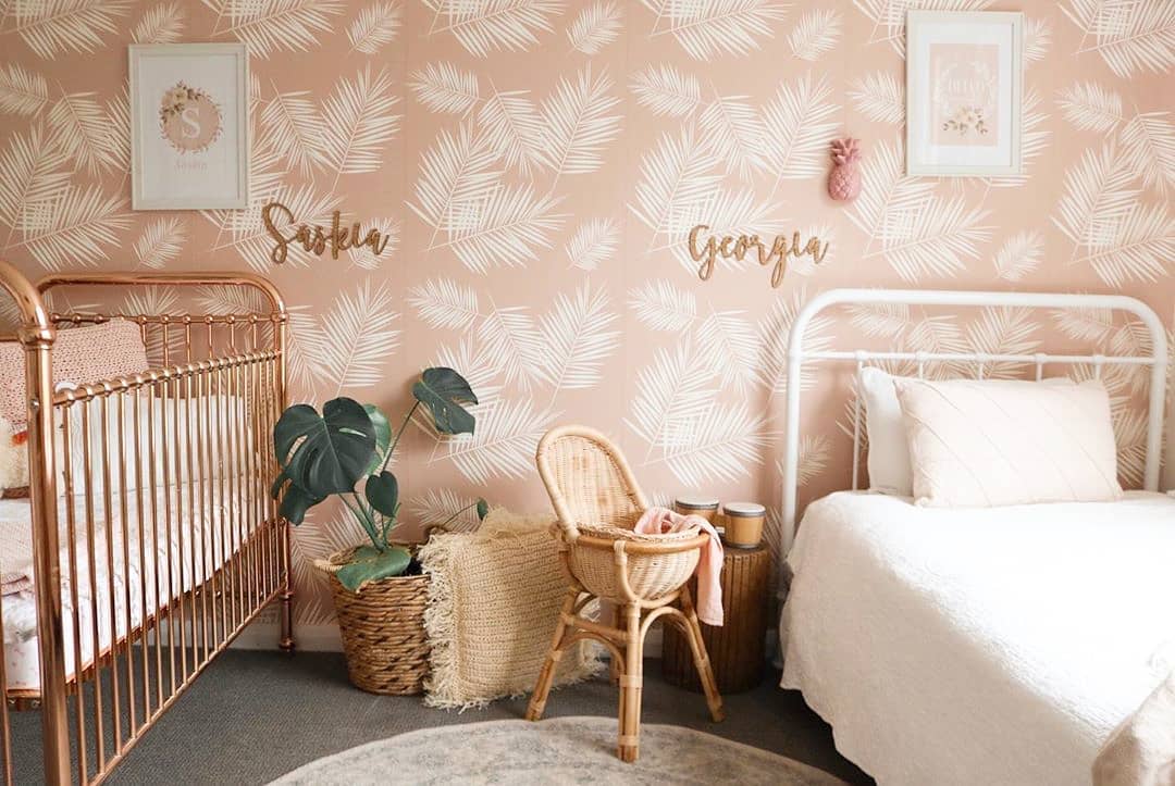 Crib and Child's Bed on Opposite Sides of a Bedroom. Photo by Instagram user @petie_decor
