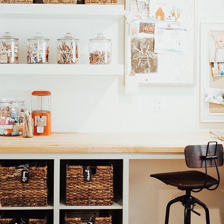 Home Desk Organized with Glass Jars and Wicker Baskets. Photo by Instagram user @organizedmamas