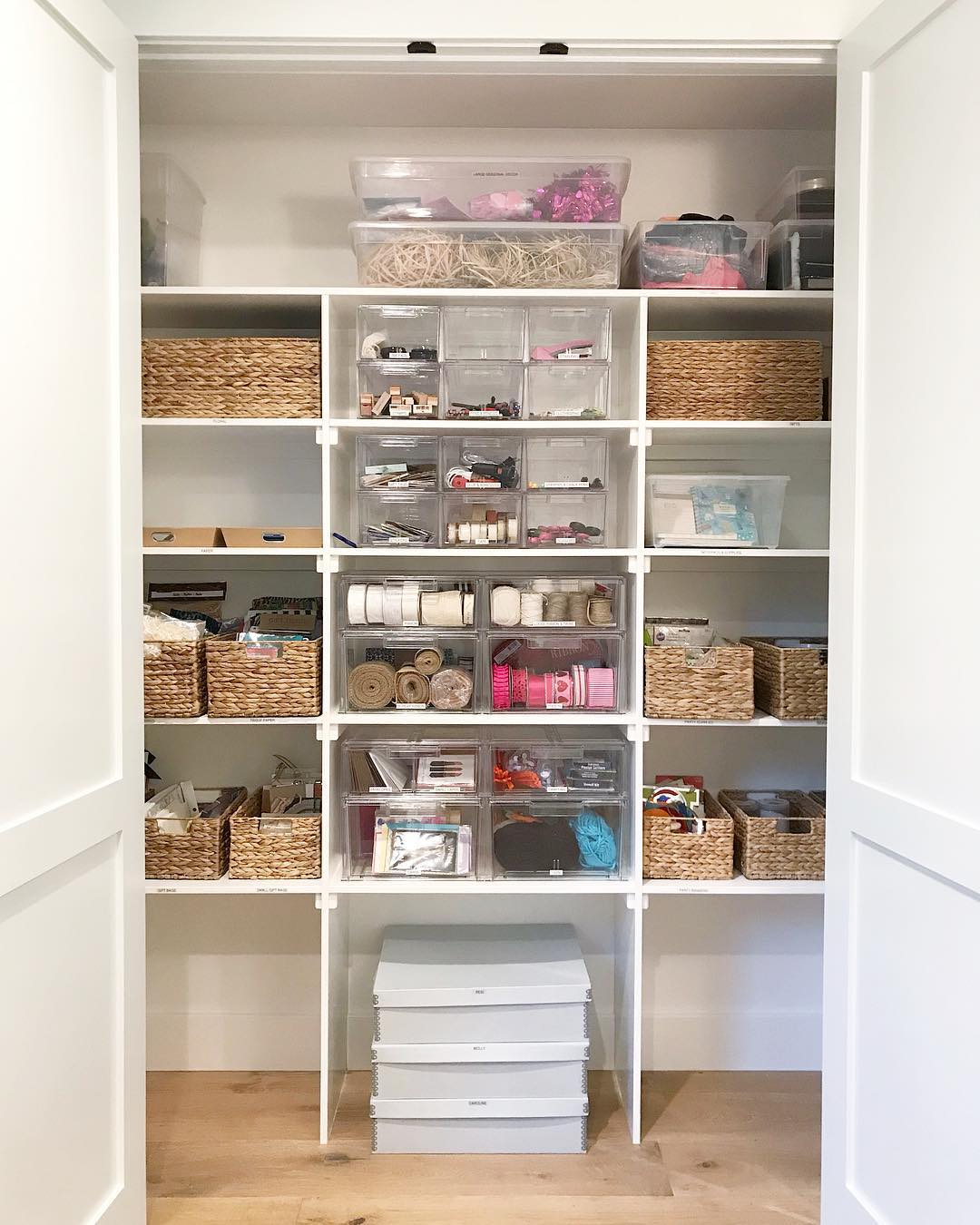 Office Closet Neatly Organized with Baskets, Shelves, and Tubs. Photo by Instagram user @simplyorganized