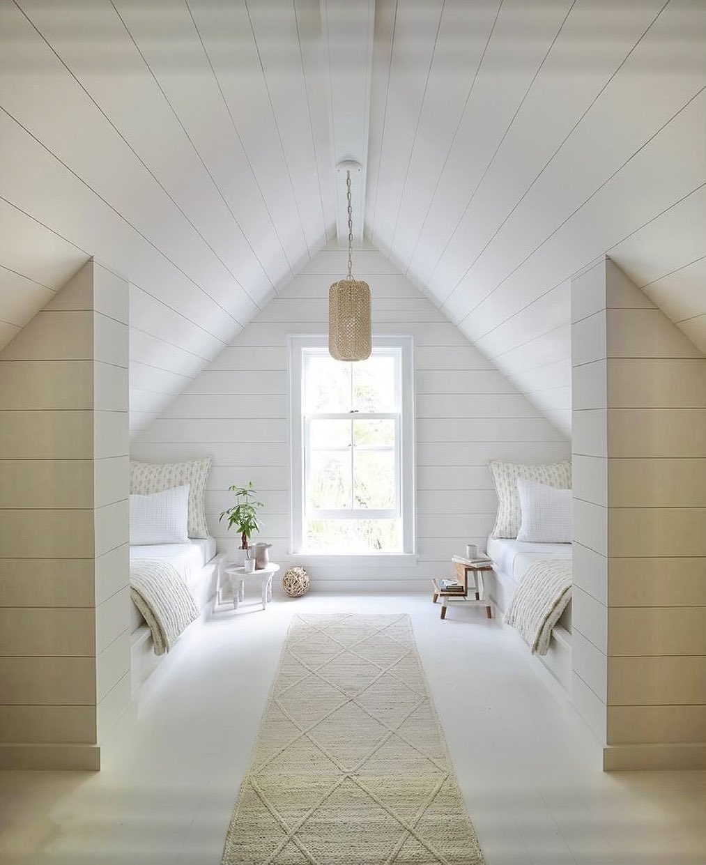 Shared Bedroom with White Color Tones Throughout.