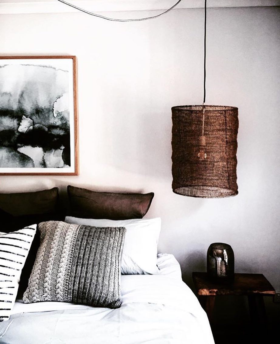 Modern Hanging Lang Beside White Bed. Photo by Instagram user @craveforinterior