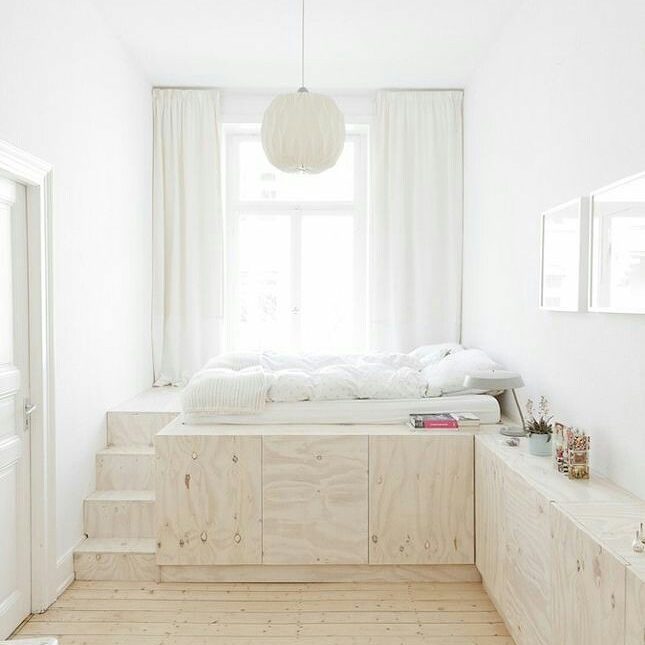 Custom-Built Wooden Platform Bed. Photo by Instagram user @carolinaleoninteriors