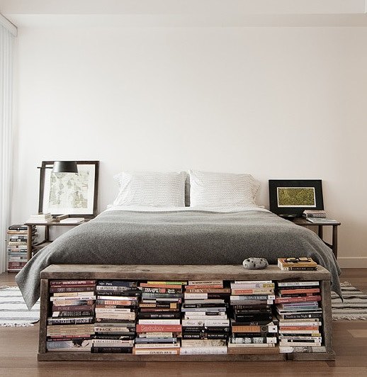 Books Stored in Footboard at End of Bed. Photo by Instagram user @goodhomesmagazine