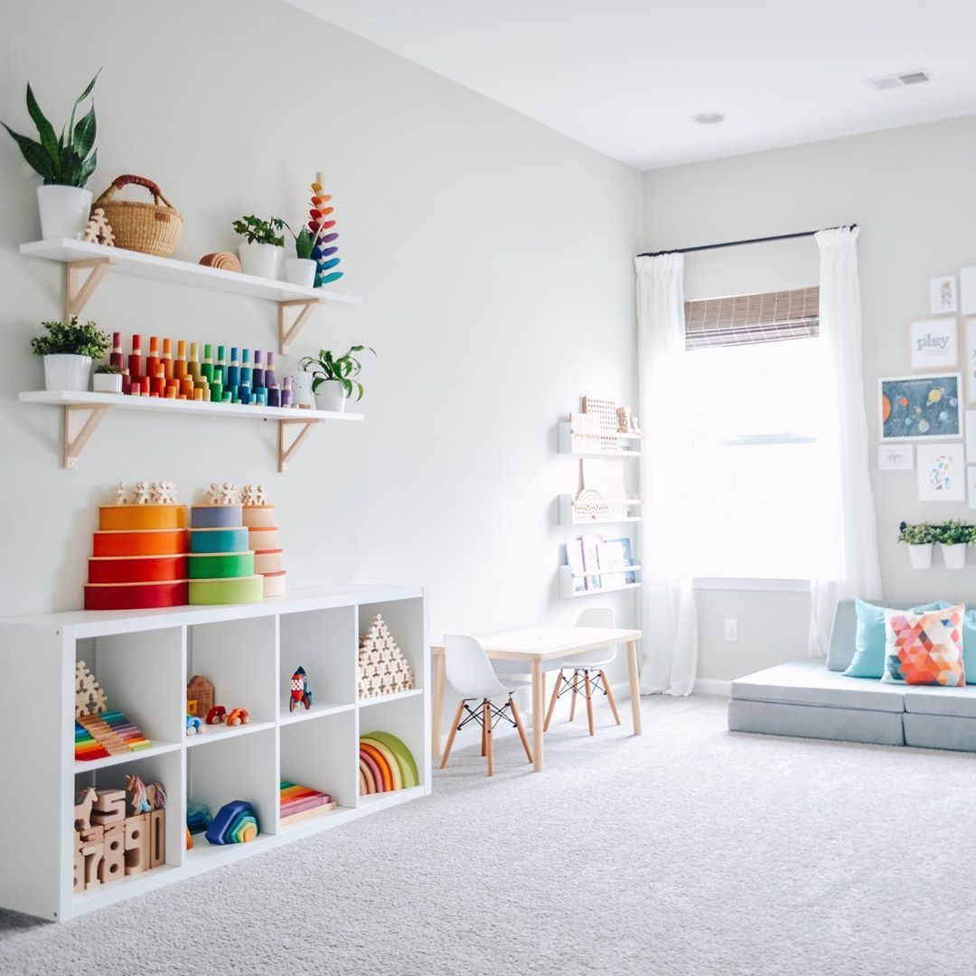 Kids Room with Bookshelves and Cubbies on Floor. Photo by Instagram user @organizedbyaly
