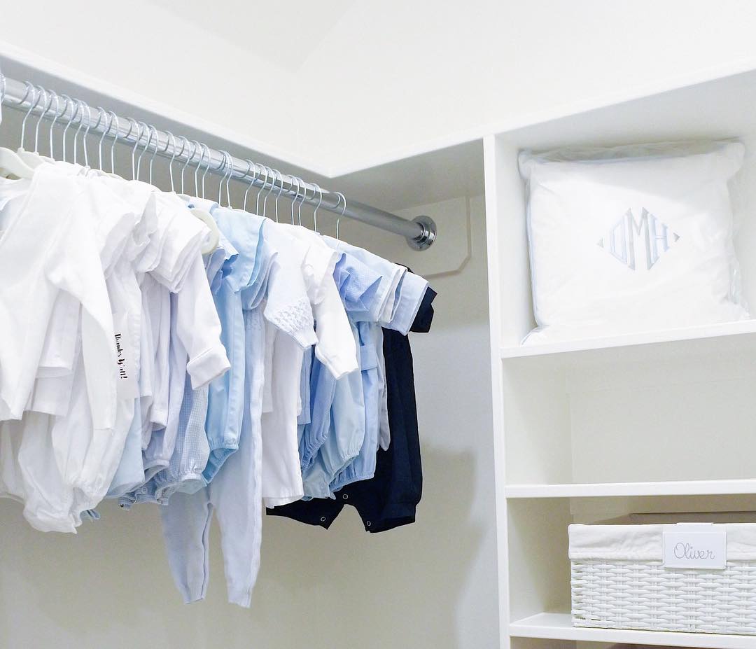 Baby Clothes Hanging in Closet. Photo by Instagram user @neatmethod