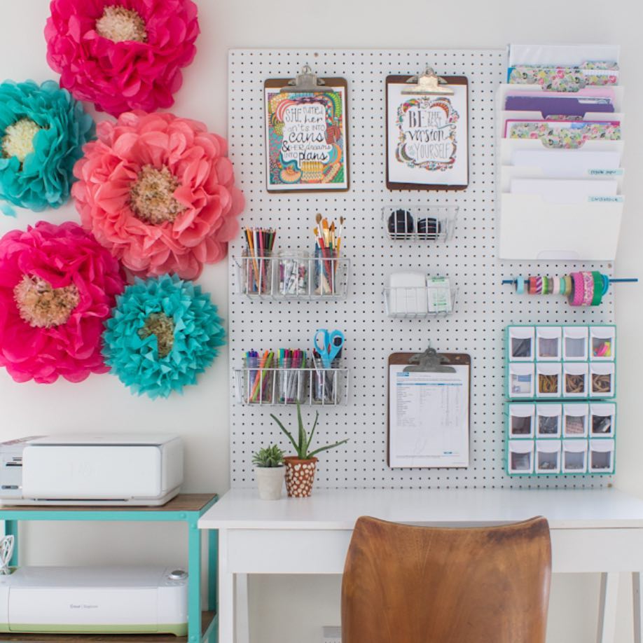 Craft room pegboard over desk. Photo by Instagram user @harmonicasa