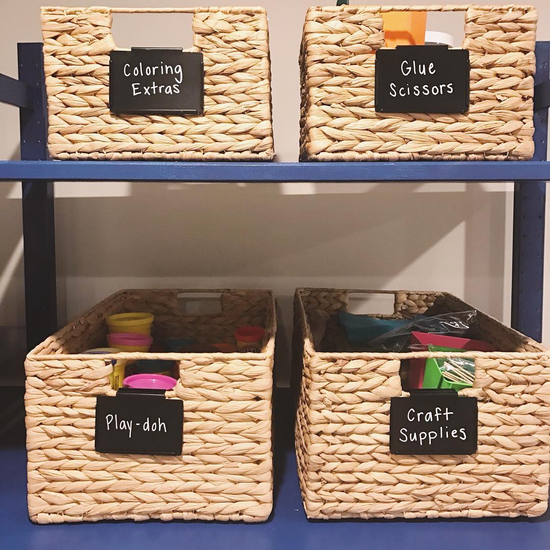 Storage bins in craft room. Photo by Instagram user @simplify_in_style