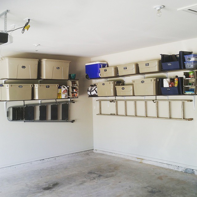 Landers hung up on garage walls underneath more garage storage shelves@beeneat_and_organized