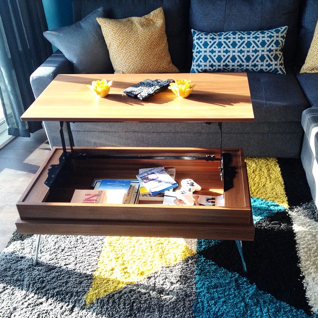 Mid-Century Modern life-top coffee table with hidden storage. Photo by Instagram user @dragansden