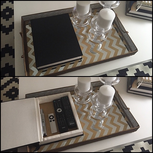 DIY remote control storage in hollow book box. Photo by Instagram user @handsondesign_