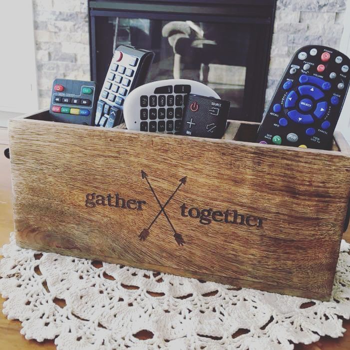 Wooden caddy to hold remotes. Photo by Instagram user @br3d3vee