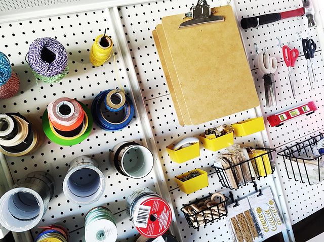 Different kinds of tape organized on a peg board. @assemblyla