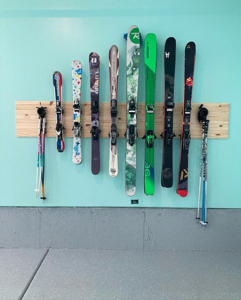 Winter Ski gear lined up on a garage wall. @midsenchnewmod