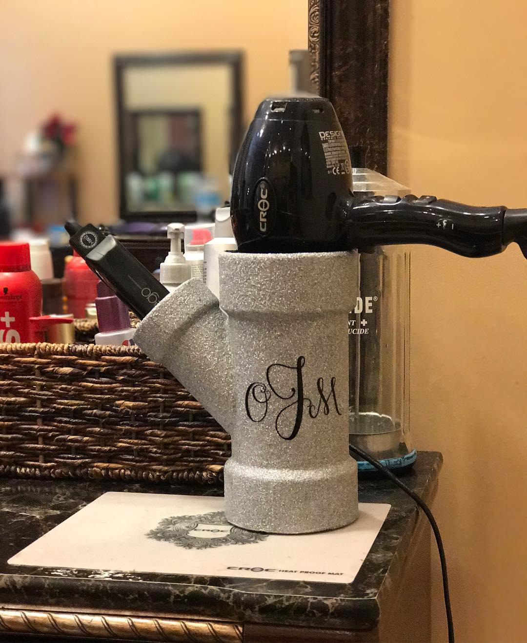 Blow Dryer Stored Safetly in Cup. Photo by Instagram user @glitteredpup_designs
