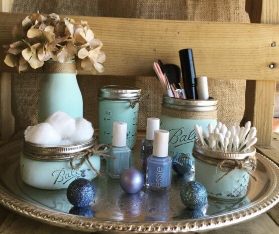 Mason Jars as Containers for Cotton Balls and Makeup Supplies. Photo by Instagram user @organizer_zu