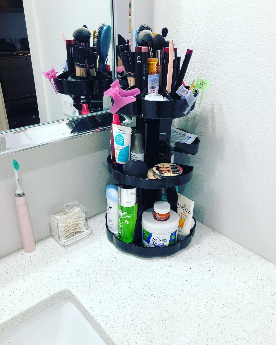 Three-tiered Storage Unit with Bathroom Supplies. Photo by Instagram user @amyday12