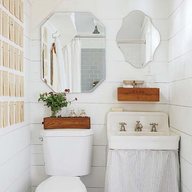 Bathroom with Flowerbox on Toilet Tank. Photo by Instagram user @designsponge