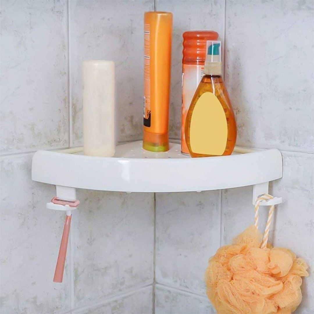 Corner Shelf in Shower with Shampoo and Razor. Photo by Instagram user @organizemeusa