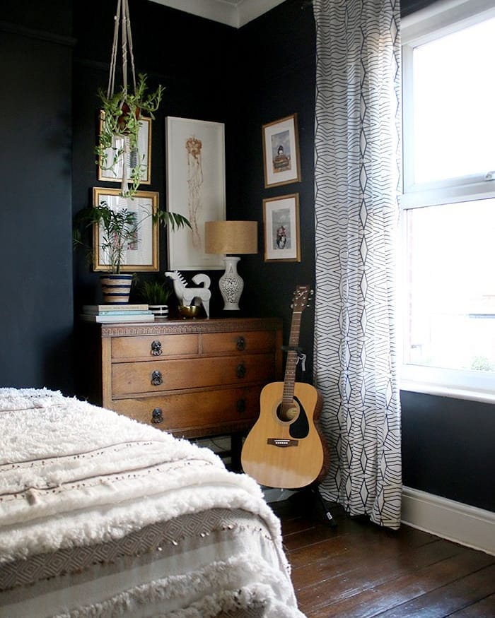 Dresser and Guitar in Corner of Bedroom. Photo by Instagram user @swoonworthyblog