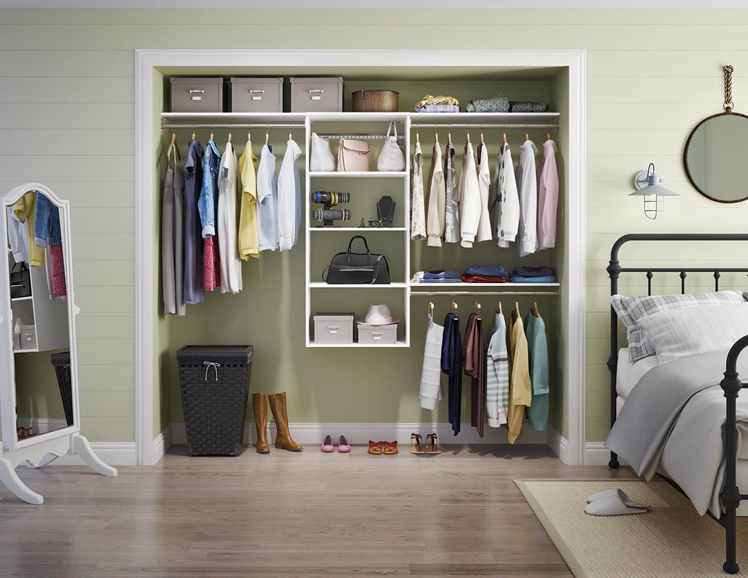 Open Closet Storing Clothes and a Laundry Basket. Photo by Instagram user @closetmaid