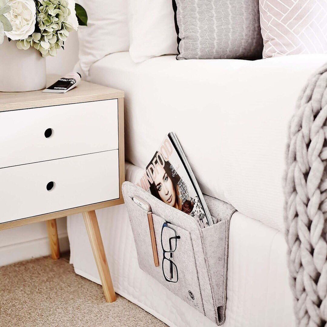 Pocket Organizer with Glasses and Magazine on Bed. Photo by Instagram user @askingmums