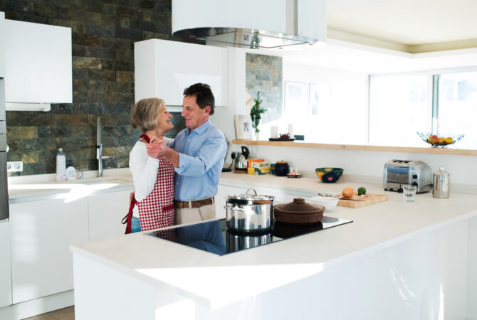 Mature couple in condo kitchen